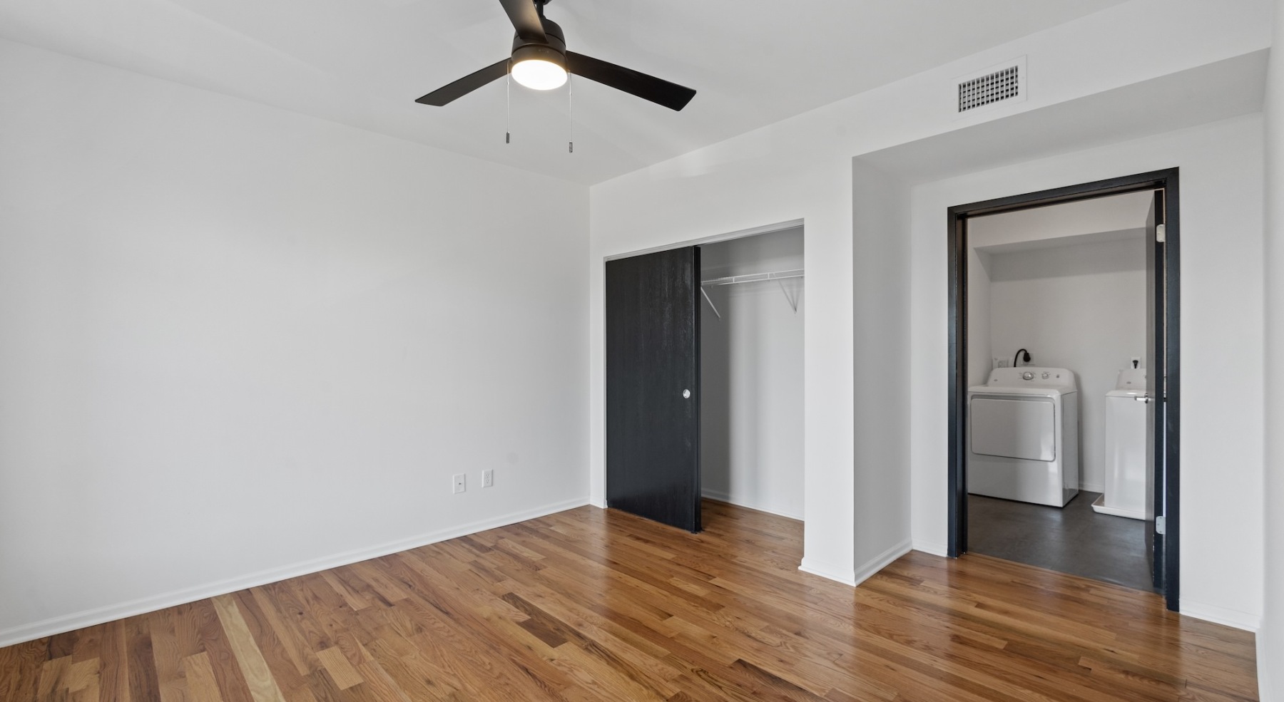 Bedroom with natural lighting and high ceilings