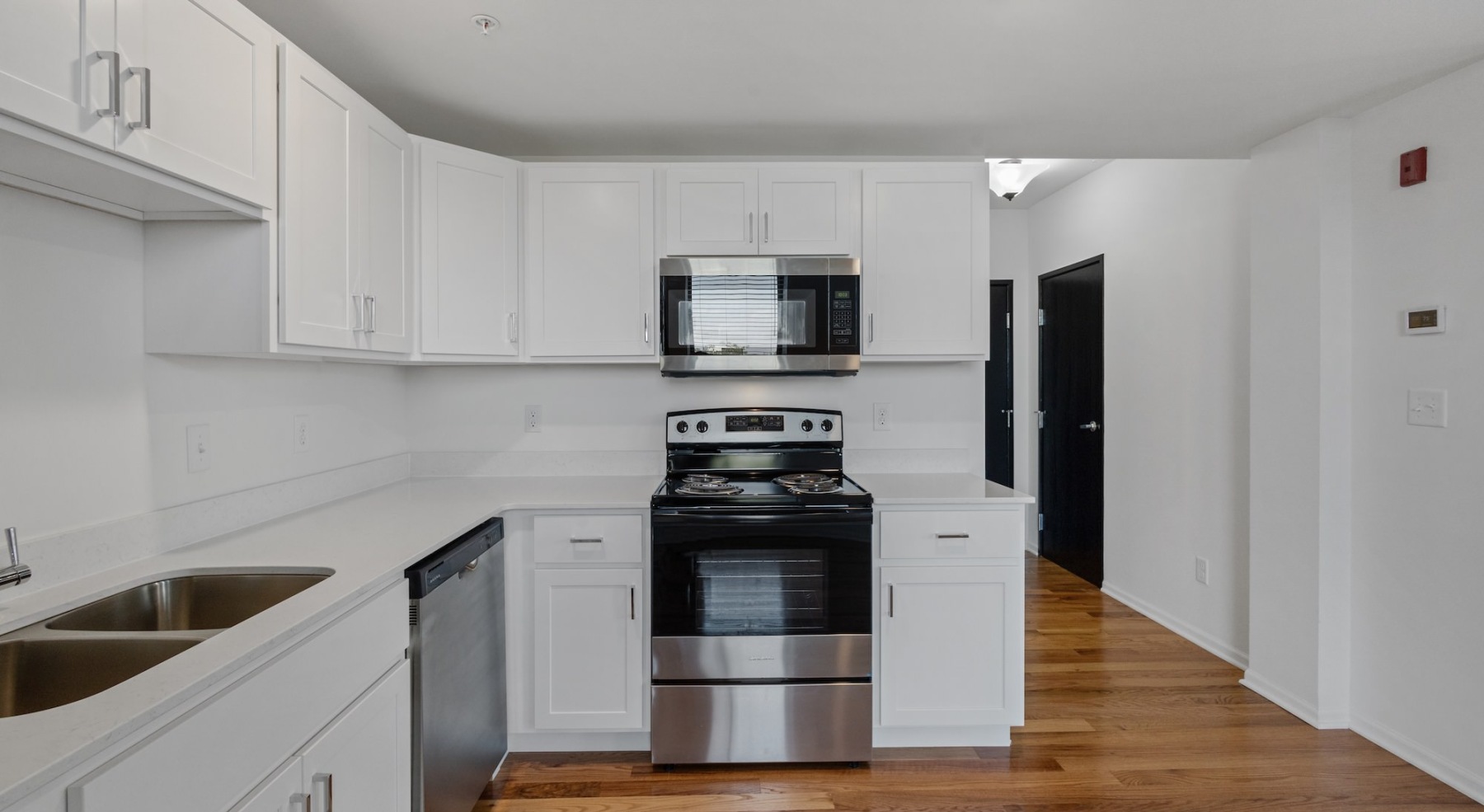 Well-lit kitchen with ample counter space