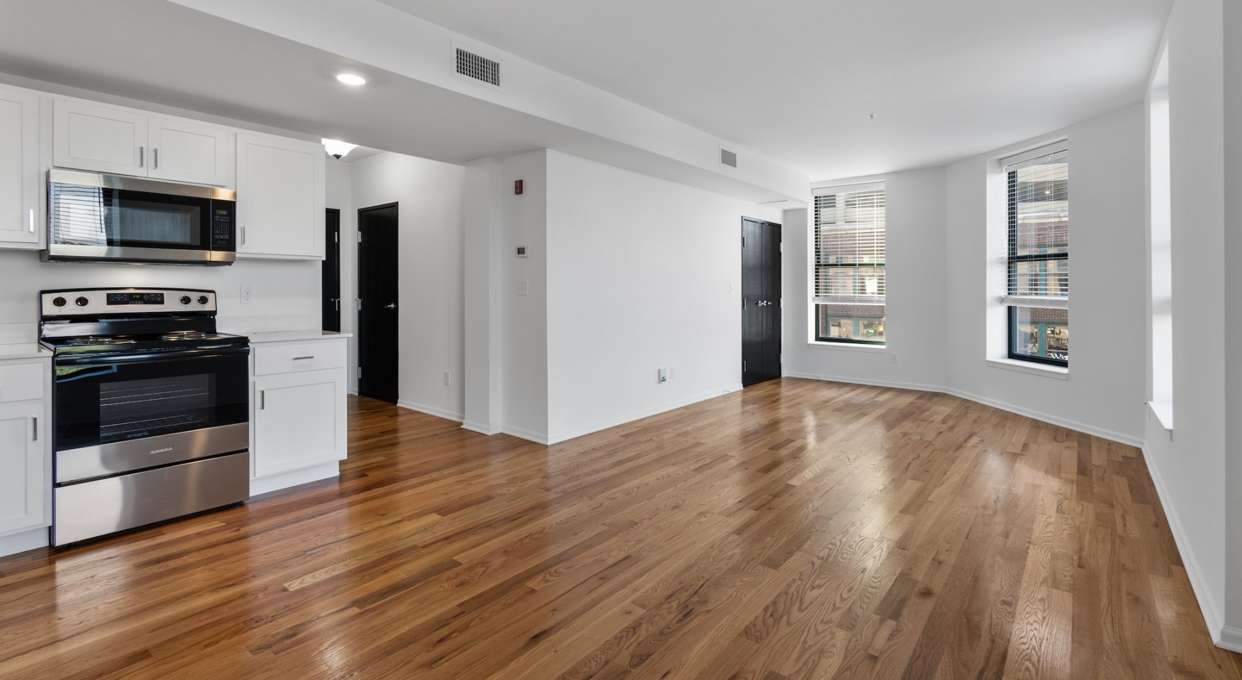 Open space living area with natural lighting
