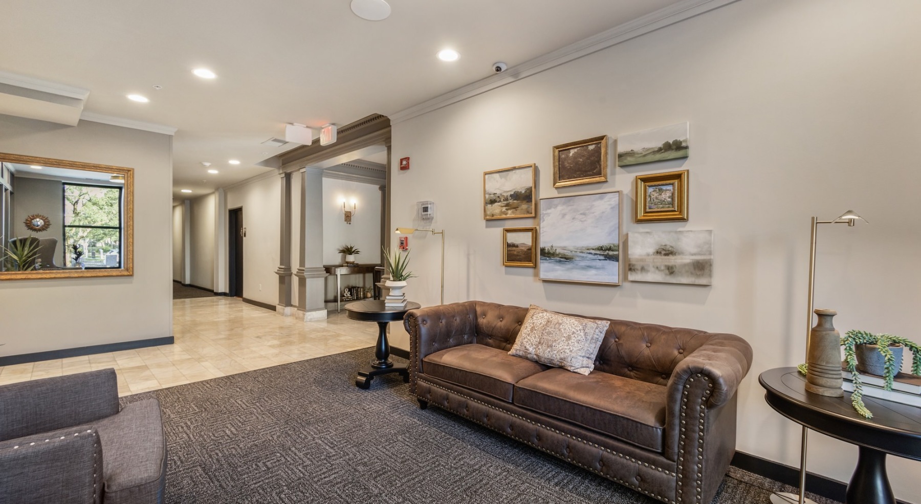 a spacious sitting area with a large sofa