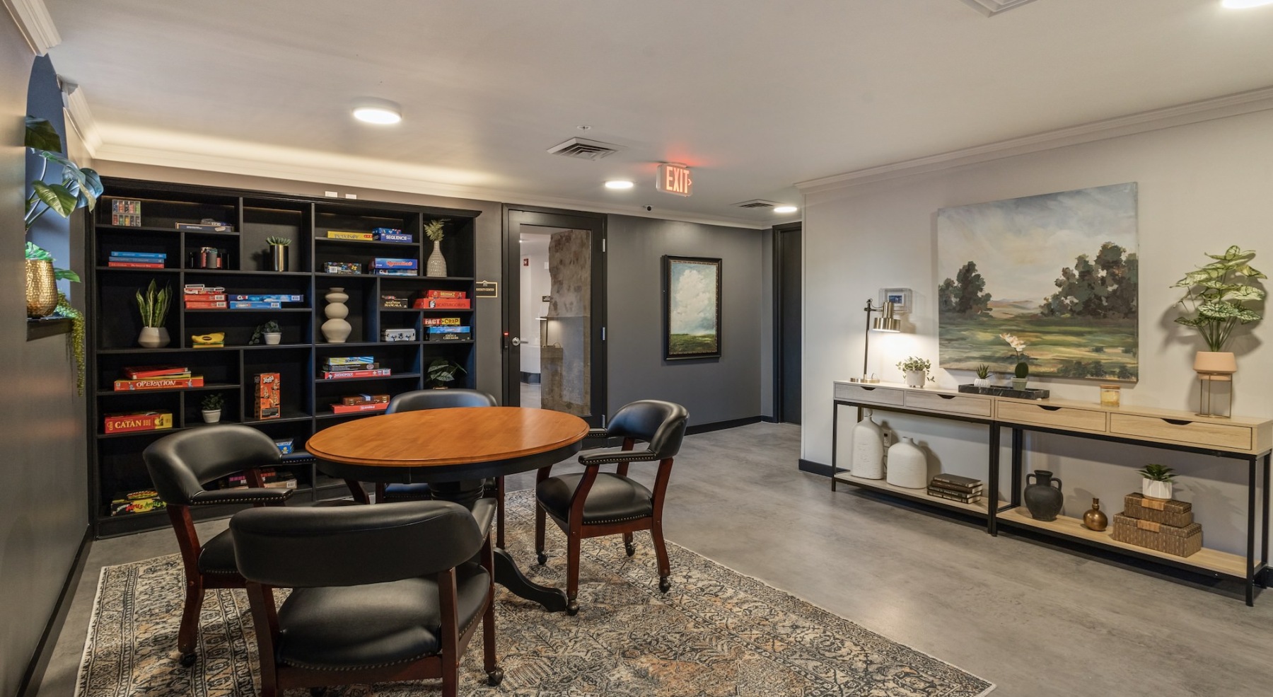 a room with shelves and a table
