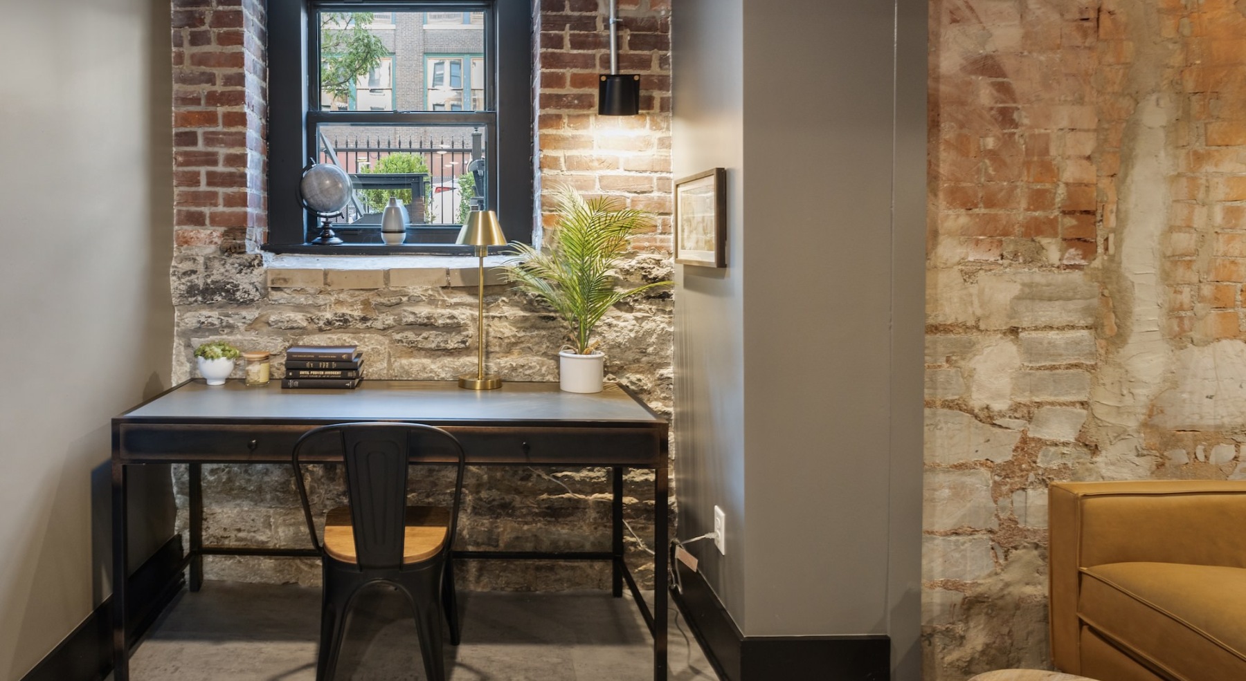 a small nook and desk near a window