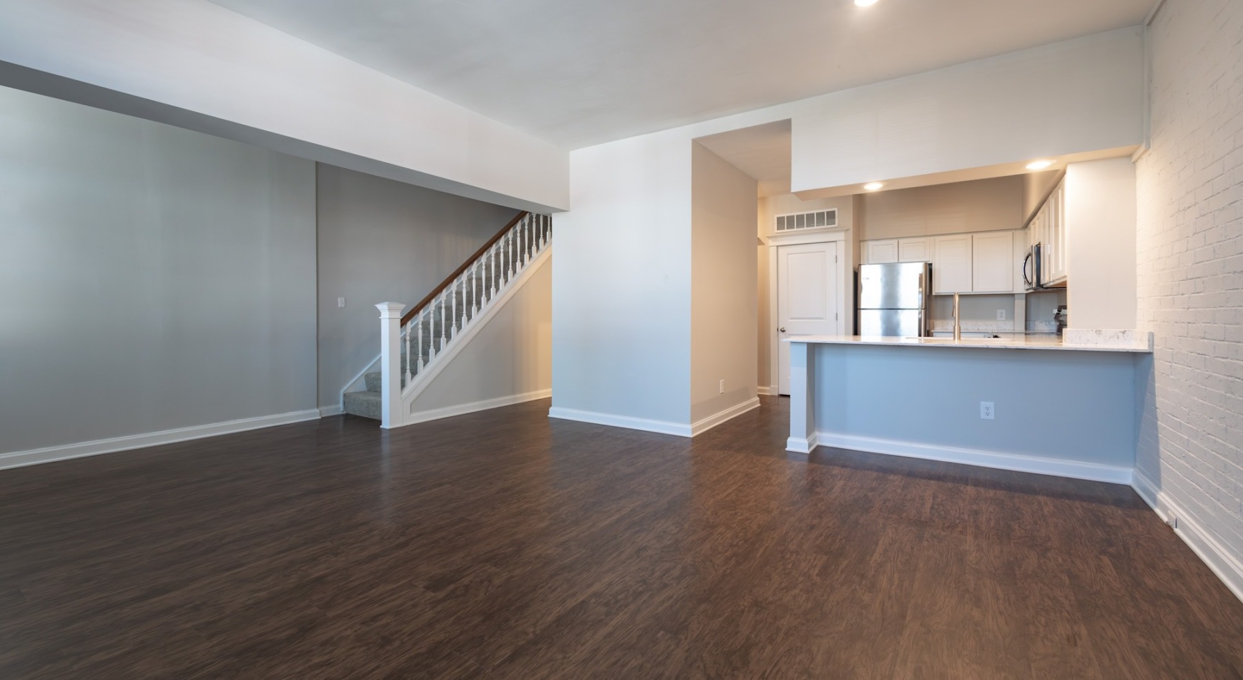 Open space living area with natural lighting
