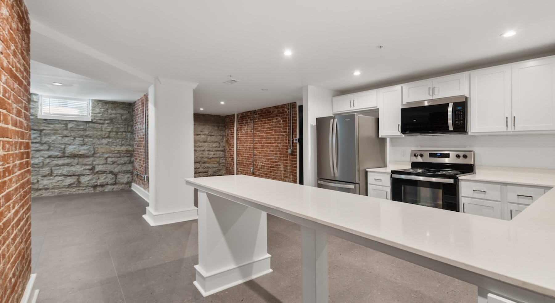 Well-lit kitchen with ample counter space