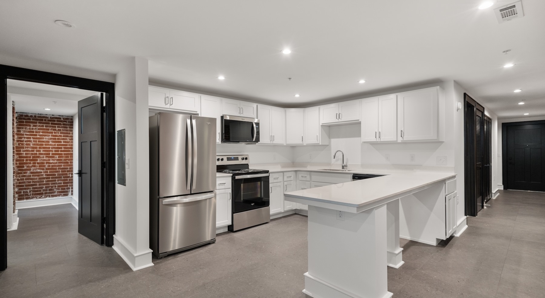 Well-lit kitchen with ample counter space