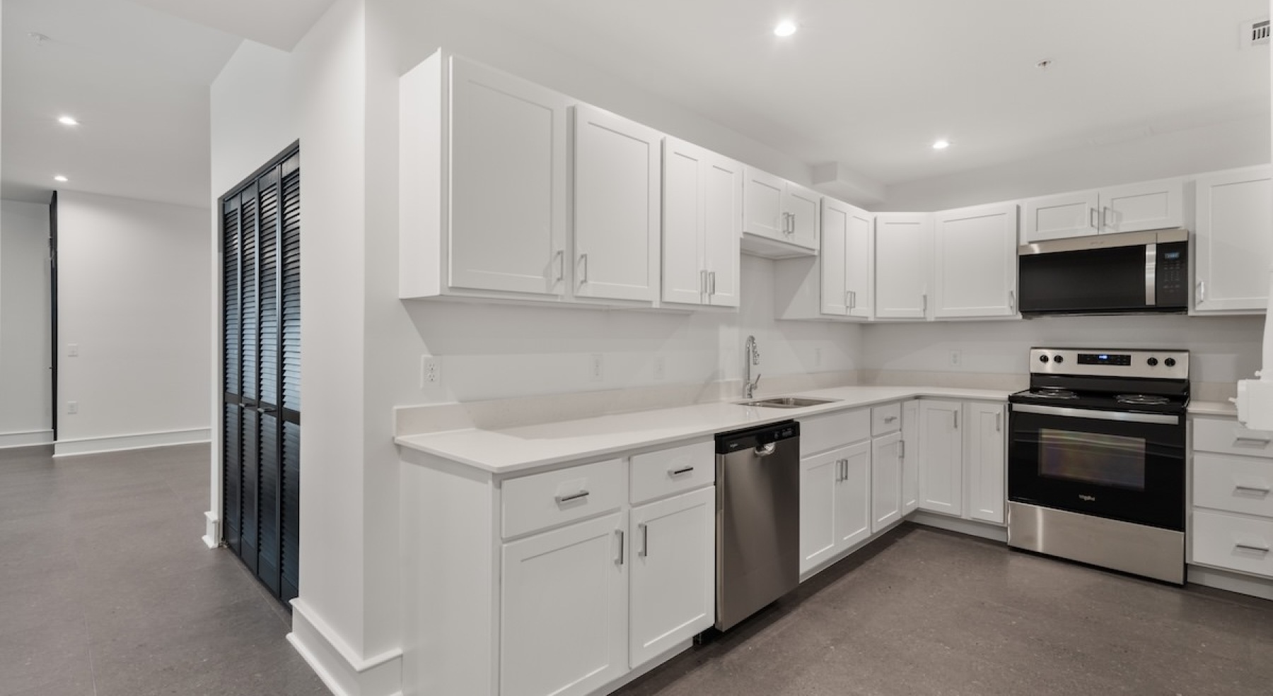 Well-lit kitchen with ample counter space