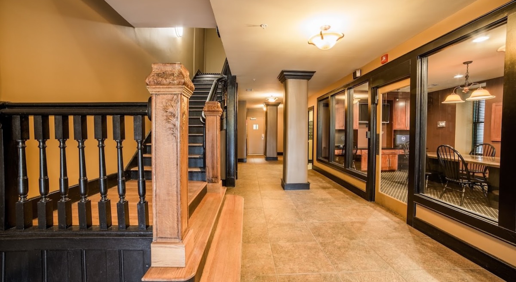 a spacious hallway with lights