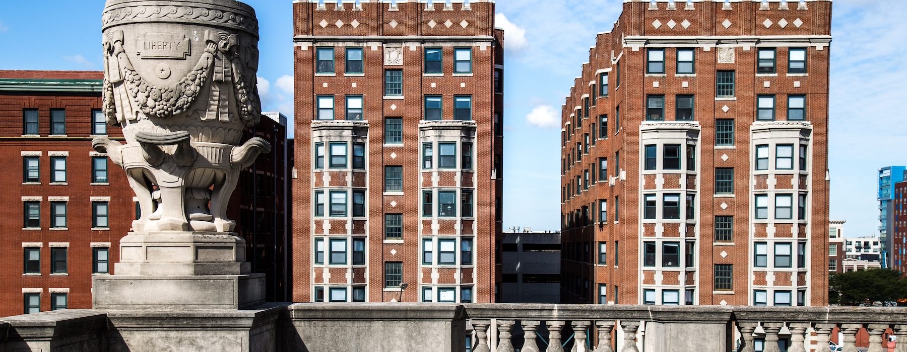 a statue in front of a building