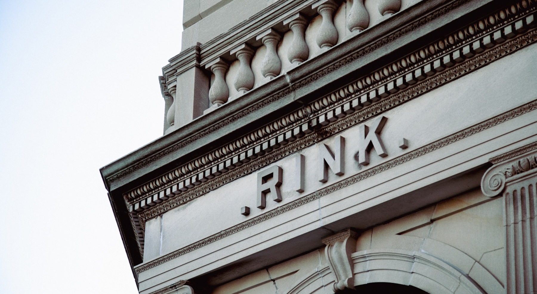 a sign on a old building